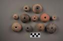 Terra cotta spindle whorls