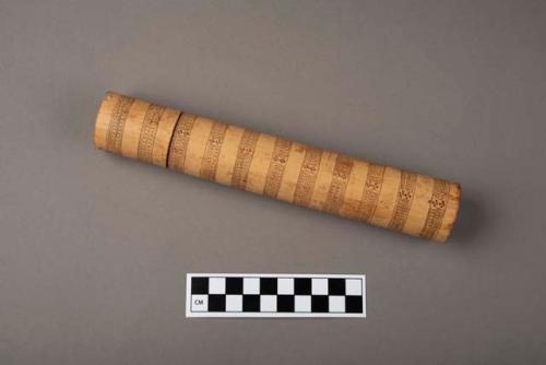 Lime container with incised design