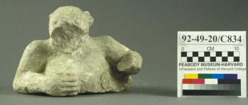 Ground stone architectural element, partial animal (jaguar?) figure