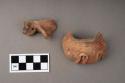 2 sherds of small pot; 1 animal lug