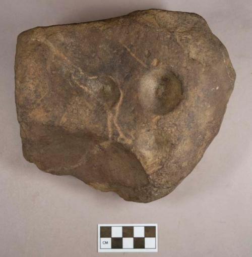 Ground stone, stone object with ground circular pits