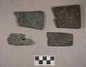 Ground stone, gorget fragments; atlatl weight fragment, winged