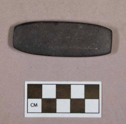 Ground stone, flat rectangular object