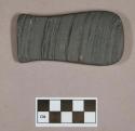 Ground stone, worked stone object, flat, flared at one end