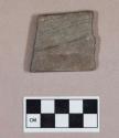 Ground stone, worked stone fragment, rectangular