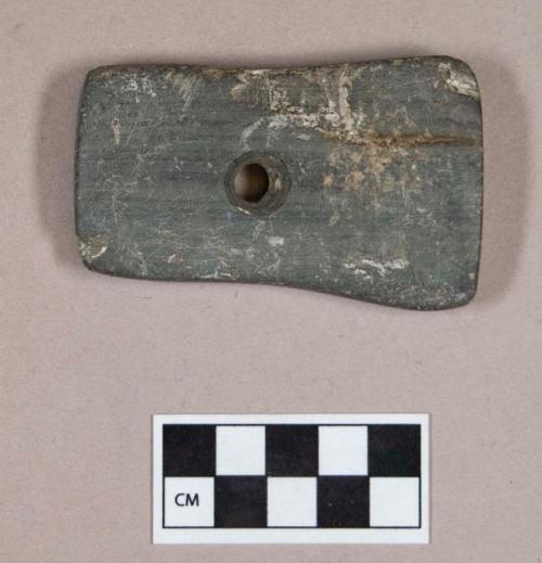 Ground stone, rectangular stone object, one perforation