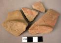 2 rim potsherds, 2  fragments of bases - plain ware, unburnished, unslipped (Wac
