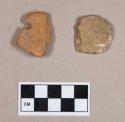 Ceramic, earthenware sherds, one perforated rim sherd, one possible worked discoidal sherd