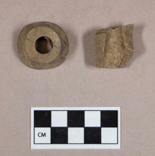 Ground stone, pipe fragments, including bowl fragment with flared rim