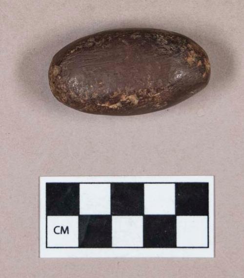 Ground stone, ovoid object, hematite