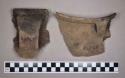 Ceramic, earthenware rim sherds, shell-tempered, cord-impressed and incised, strap handles