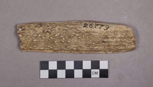 Organic, utilized antler, rectangular-cut object with sharpened blade