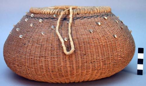 Unusual twined California basket using whole weft material (not split).