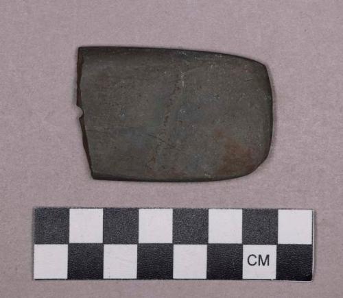 Ground stone, perforated stone fragment