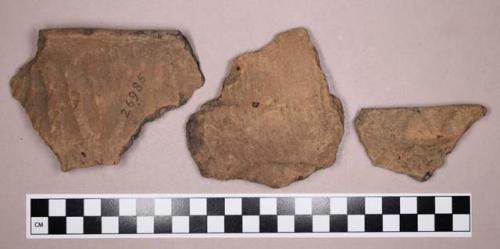 Ceramic, earthenware rim and body sherds, cord-impressed, undecorated, and incised, includes shell-tempered