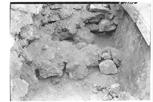 Caracol. Upper platform, shaft at base of trench of 1929 circular structure exte
