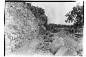 Caracol. Base of lower platform, SW. corner, excavation preceding repair.