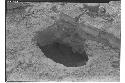 Caracol, olla under block of masonry top of niche - upper stairway.