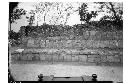 Masonry of interior south corridor wall, west of doorway at Mercado.