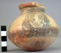 Pottery jar, base red, upper zone white with black ornamentation