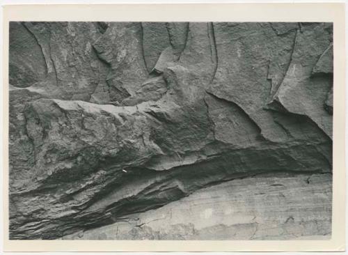 Pictographs of patterned hand prints (left) and human figure (right)