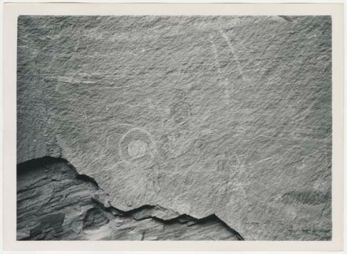 Pictographs of circles and a human figure