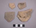 4 potsherds - thin black "Urfirnis" coat