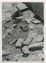 Rocks on canyon floor, possibly part of a structure