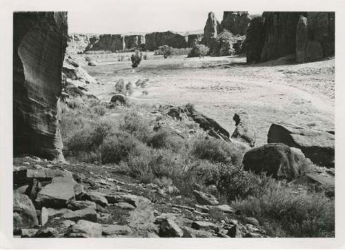 View of canyon, with possible structure in foreground