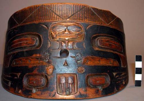 Carved wooden visor