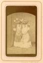 Portrait of Two Women with Fruit Bowls on their Heads and Jars on their Hands