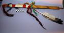 Wooden pipe stem--ribbons and 3 feathers attached; wrapped with porcupine quills