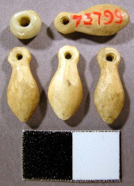 Ivory pendants used by women