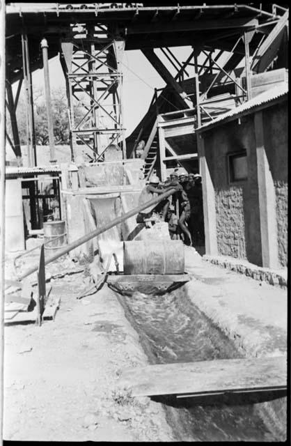 Men operating equipment at Abenab Mine