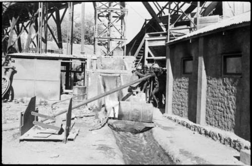 Men operating equipment at Abenab Mine