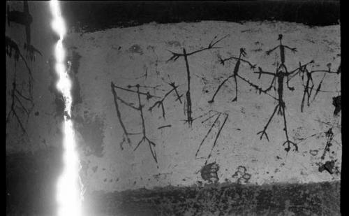 Drawings on a wall in an Okwa hut by local children
