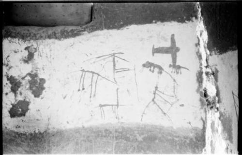 Drawings on a wall in an Okwa hut by local children