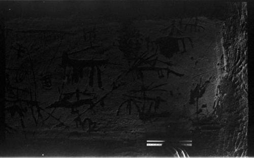 Wall drawings in an Okwa hut