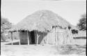 Exterior of the Okwa hut with wall drawings