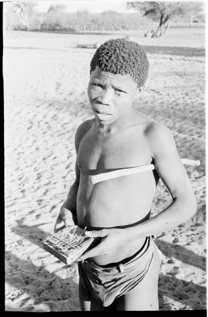 Boy playing musical instrument