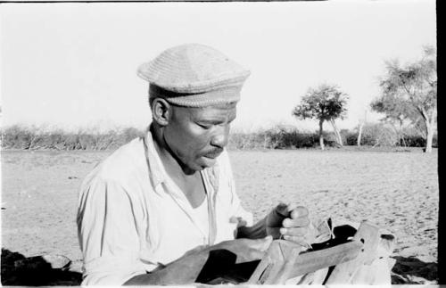 Chuana sewing at Okwa