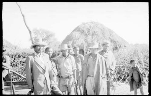 Boys, his brother, and local workers