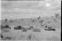 Four trucks in a riverbed out from Molepolole