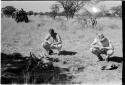 William Donnellan and Caspar Kruger looking at animal bones