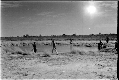 Expedition members getting water for washing