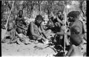 The group at Chukudu; woman scraping juicy root