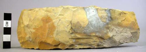 Limestone wedge chipped