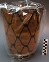 Cylindrical basket, coiled. Geometric designs. Made for trade purposes