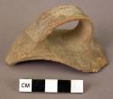 Fine glazed pottery handle fragment