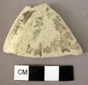 Glazed rim potsherd